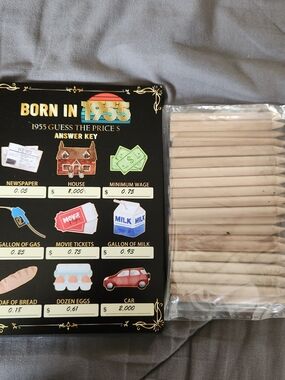 Born in 1955 Scratcher Game With Wood Sticks